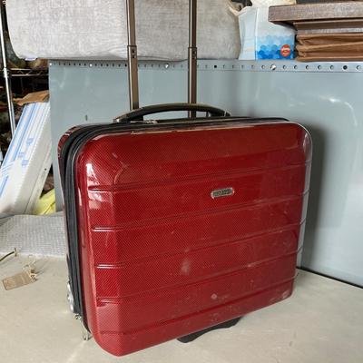 135 -Divoga overnight rolling suitcase