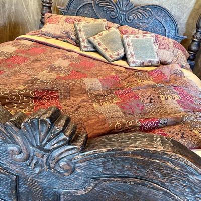 Beautiful hand carved king size bed, headboard, and footboard. Tempur-pedic mattress, sheets, and pillows included.
