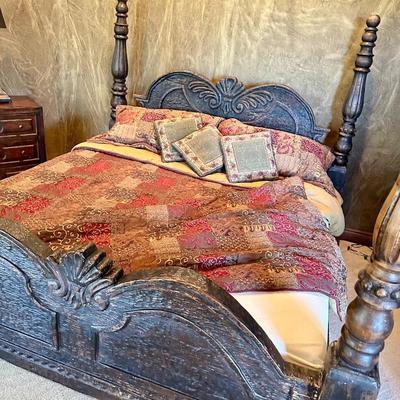 Beautiful hand carved king size bed, headboard, and footboard. Tempur-pedic mattress, sheets, and pillows included.