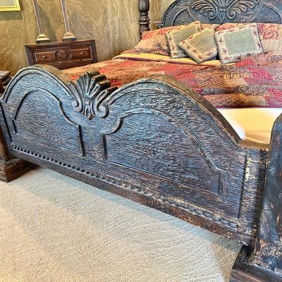 Beautiful hand carved king size bed, headboard, and footboard. Tempur-pedic mattress, sheets, and pillows included.