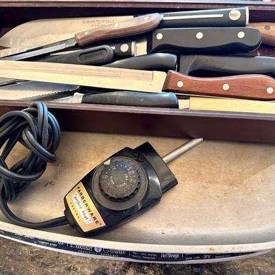An large assortment of knives and an Electric Skillet
