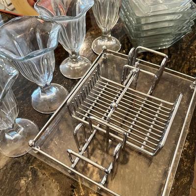 Clear glass ice cream cups and bowls and silverware holder for parties