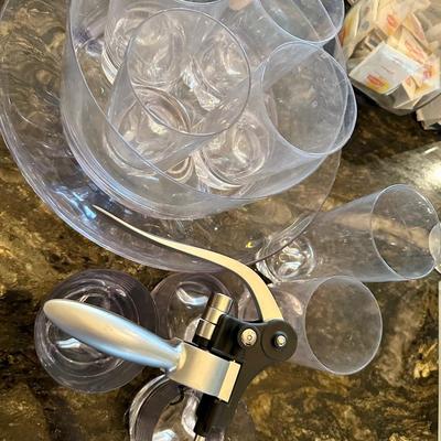 Acrylic large bowl and acrylic glasses with rabbit wine opener