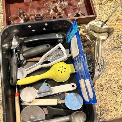 Assortment of kitchen gadgets and utensils - cookie cutters, Everything in photo
