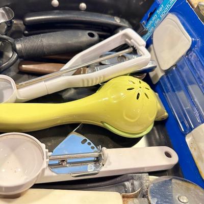 Assortment of kitchen gadgets and utensils - cookie cutters, Everything in photo