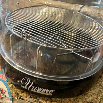 Nuwave cooker and tongs and stand up chicken baker