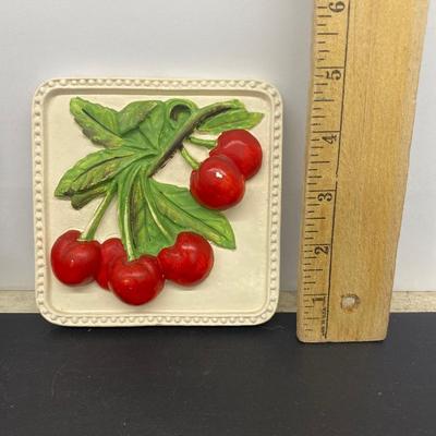VINTAGE CHALKWARE WALL HANGERS AND AN IRON ROOSTER HOOK