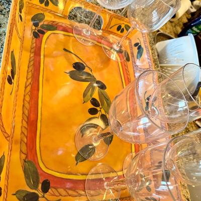 Plastic tray and wine glasses