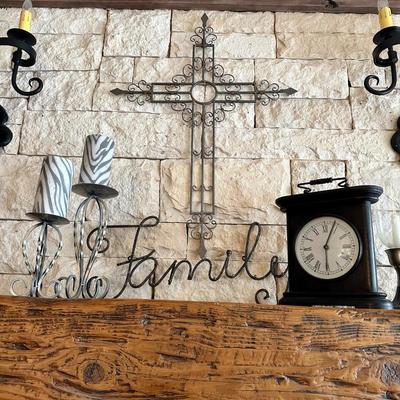 Items from the mantle Large cross, 2 candle holders, Family wall hanging, clock (attached candles not included)