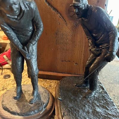 Golfer statues