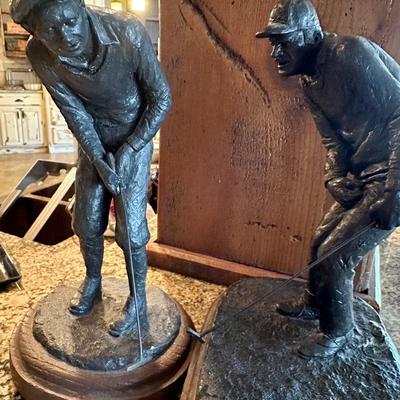 Golfer statues