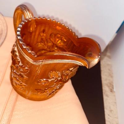 Beautiful Carnival Glass items and Miniature Nesting Hen Covered Dish with Peach Table Cloth