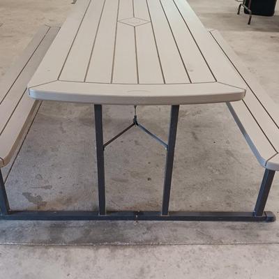 Fold-up Discover Home Products Picnic table with adjustable benches