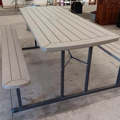Fold-up Discover Home Products Picnic table with adjustable benches