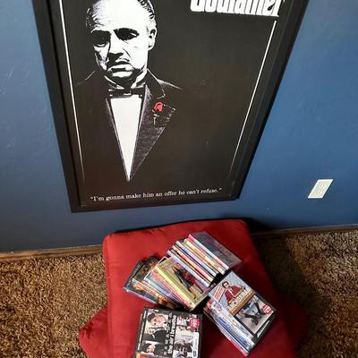 Movie poster The Godfather and collection of DVDs and 2 floor pillows