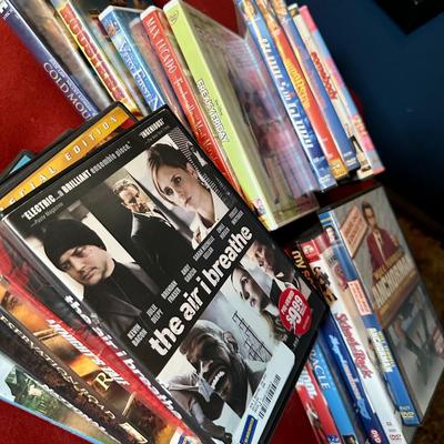 Movie poster The Godfather and collection of DVDs and 2 floor pillows
