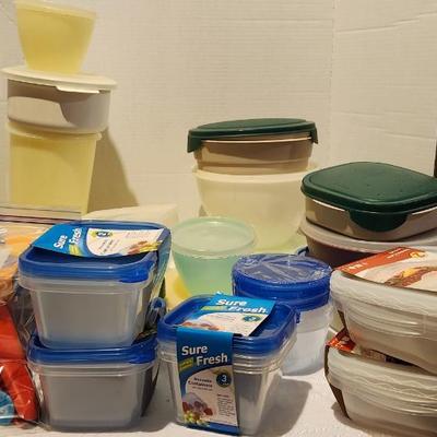 Tupperware and new food storage containers and chip clips