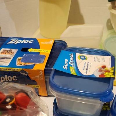Tupperware and new food storage containers and chip clips