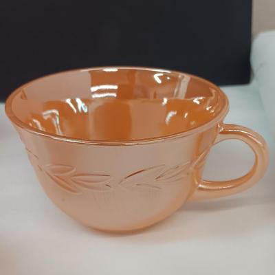 Six peach luster Fire king mugs with Castleton China plate