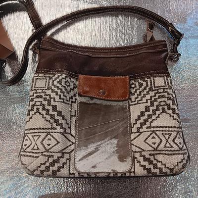 Four nice purses with shoulder straps