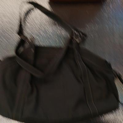 Four nice purses with shoulder straps