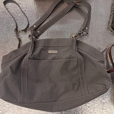 Four nice purses with shoulder straps