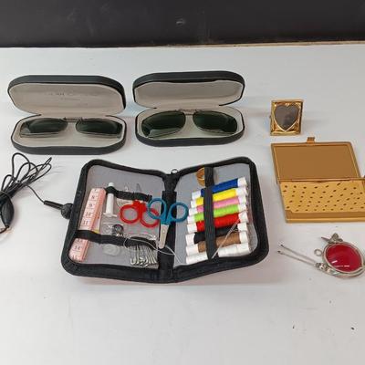 Sunglass lenses with cases - small travel sewing kit - metal wallet - and more