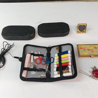 Sunglass lenses with cases - small travel sewing kit - metal wallet - and more