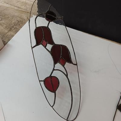 Two stained - glass floral window decor pieces