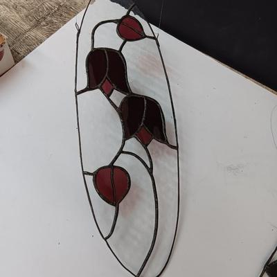Two stained - glass floral window decor pieces