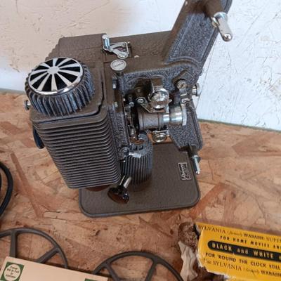 Revere Eight reel to reel Projector with Da-Lite projector screen and brand-new bulb in original box