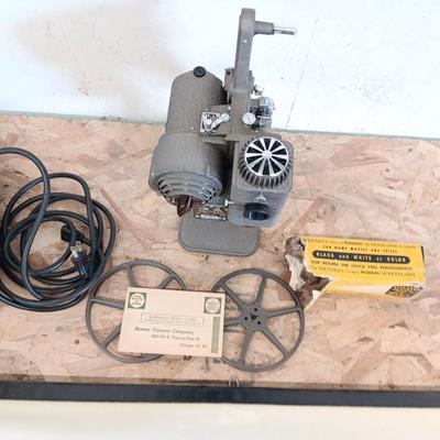 Revere Eight reel to reel Projector with Da-Lite projector screen and brand-new bulb in original box