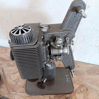 Revere Eight reel to reel Projector with Da-Lite projector screen and brand-new bulb in original box