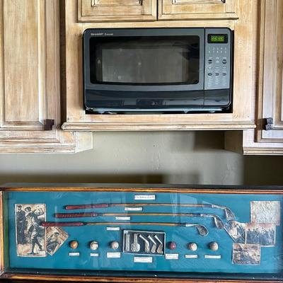 History of golf framed art and microwave