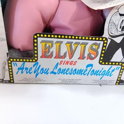 Singing Elvis plush Elvis sings " Are you lonesome tonight"