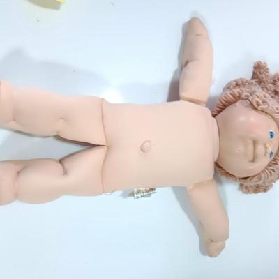Collectible Cabbage Patch girl doll with clown outfit