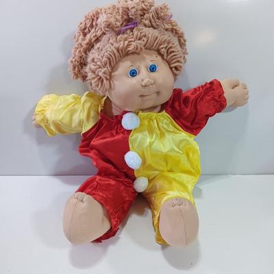 Collectible Cabbage Patch girl doll with clown outfit