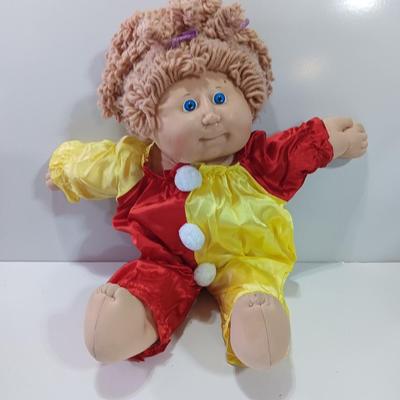 Collectible Cabbage Patch girl doll with clown outfit