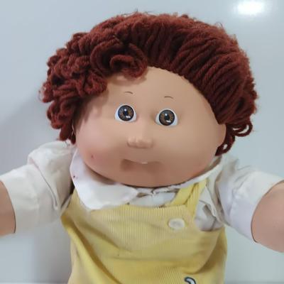 Collectible Cabbage Patch boy doll with shoes and outfit