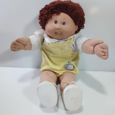 Collectible Cabbage Patch boy doll with shoes and outfit