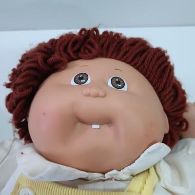Collectible Cabbage Patch boy doll with shoes and outfit