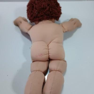 Collectible Cabbage Patch boy doll with shoes and outfit