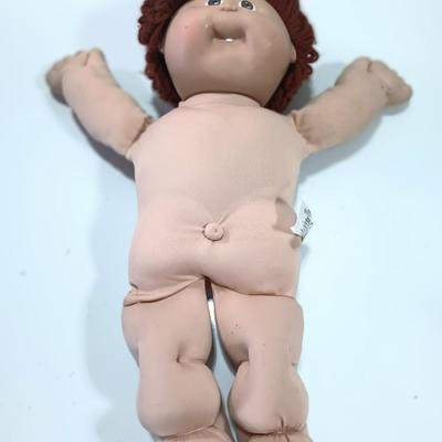 Collectible Cabbage Patch boy doll with shoes and outfit