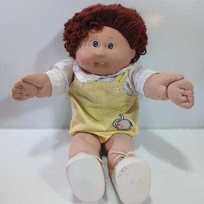 Collectible Cabbage Patch boy doll with shoes and outfit