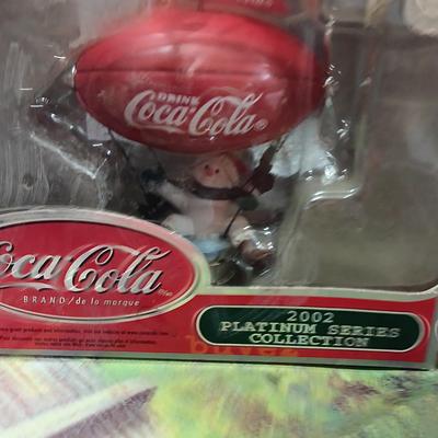 Coca Cola collectibles - bottles - cards - glasses and a tapestry