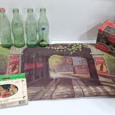 Coca Cola collectibles - bottles - cards - glasses and a tapestry