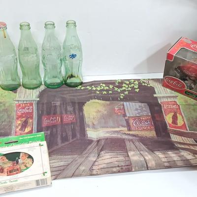 Coca Cola collectibles - bottles - cards - glasses and a tapestry