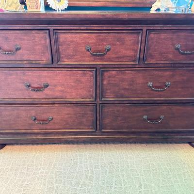 The wooden dresser and mirror. Perfect for any bedroom. (Only the dresser and mirror will be sold in this particular lot).