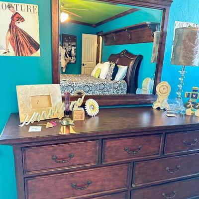 The wooden dresser and mirror. Perfect for any bedroom. (Only the dresser and mirror will be sold in this particular lot).