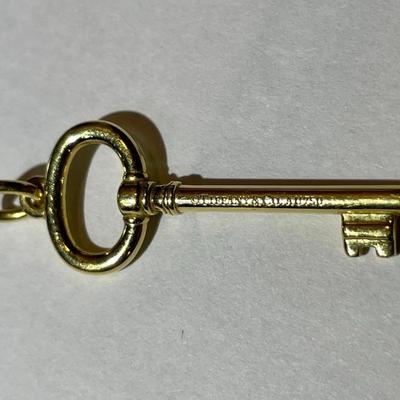 Vintage Tiffany & Co 18k Yellow Gold Key Pendant in VG Preowned Condition.